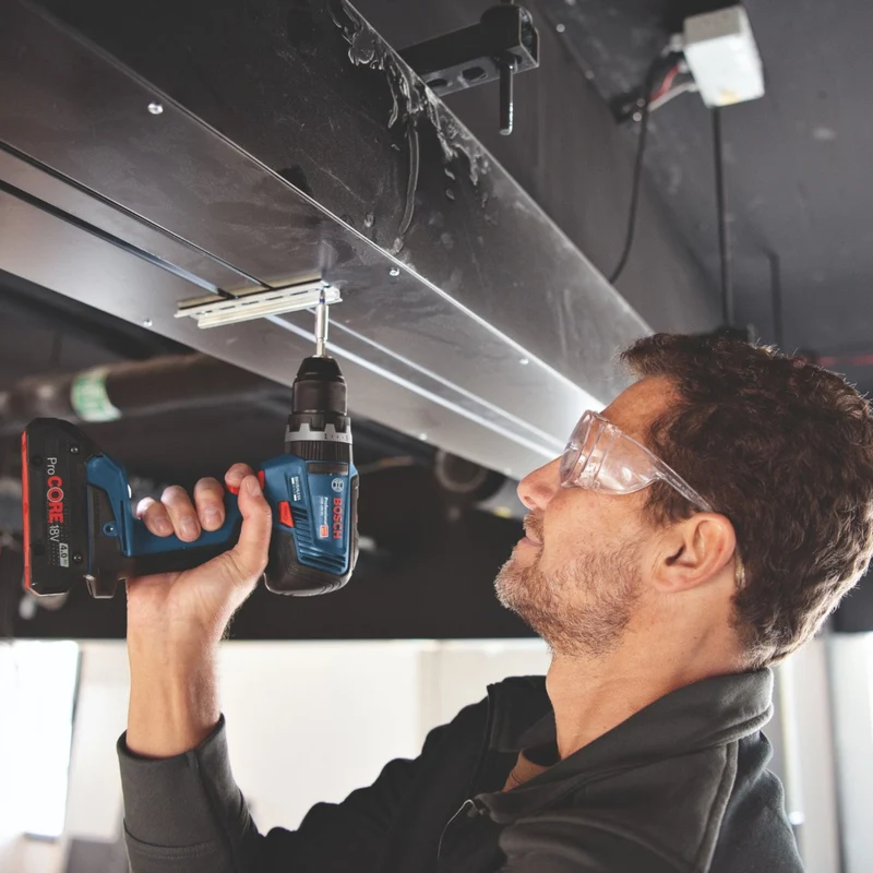 Bosch GSB 18V-55 Professional Akku Schlagbohrschrauber 18 V 55 Nm Brushless + 2x Akku 2,0 Ah + Ladegerät